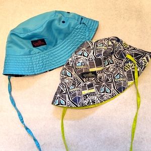 Two UV Skinz reversible summer bucket hats.